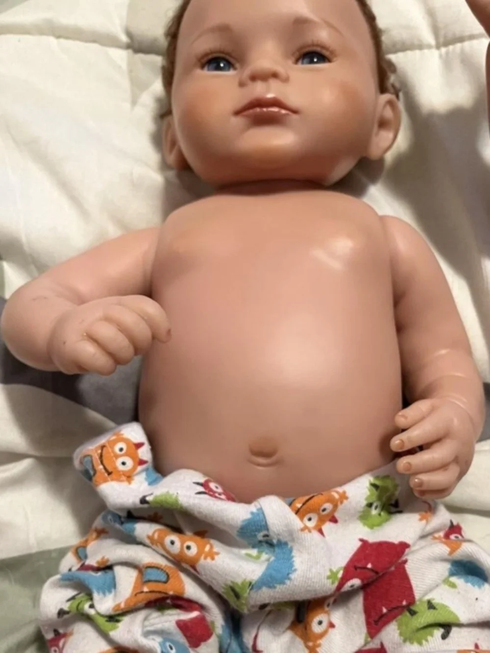 Reborn Baby Doll with Blue Eyes and Colorful Monster Pants